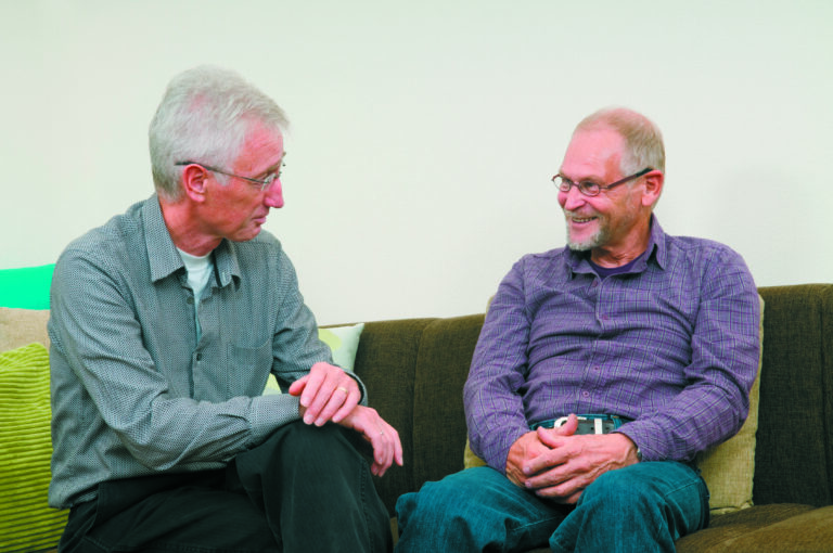 Two gentlemen talking