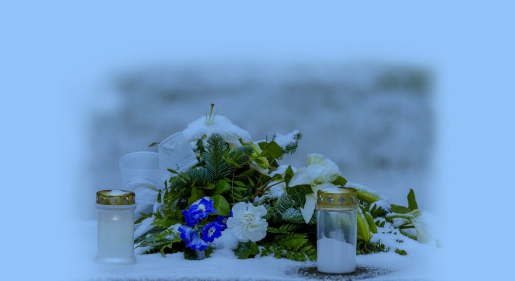 memorial with candles and flowers